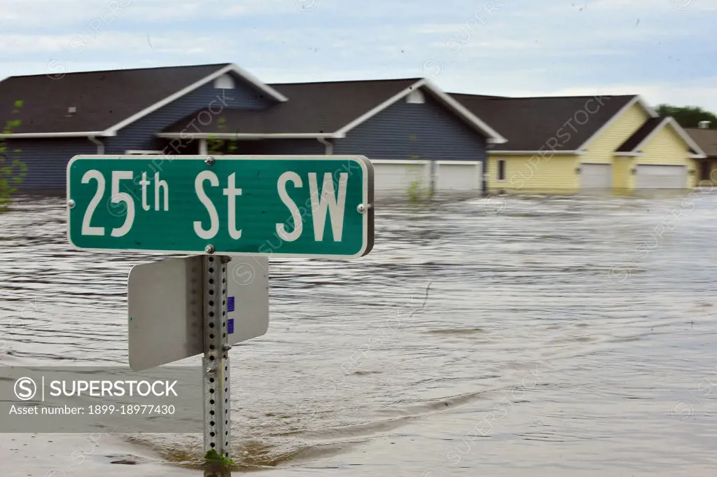 Ten feet of water flood nearly 20 percent of the neighborhood throughout the city of Minot, N.D., leaving more than 4,000 homes inundated by flooding, June 25. 