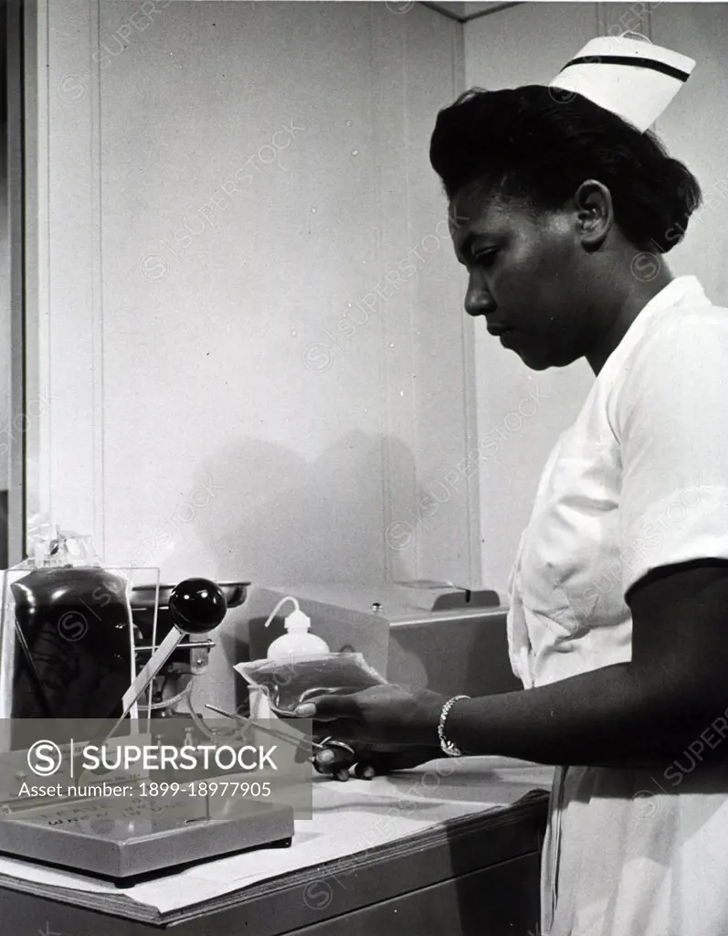 An African-American  Blood Bank nurse ca. mid-1900s. 