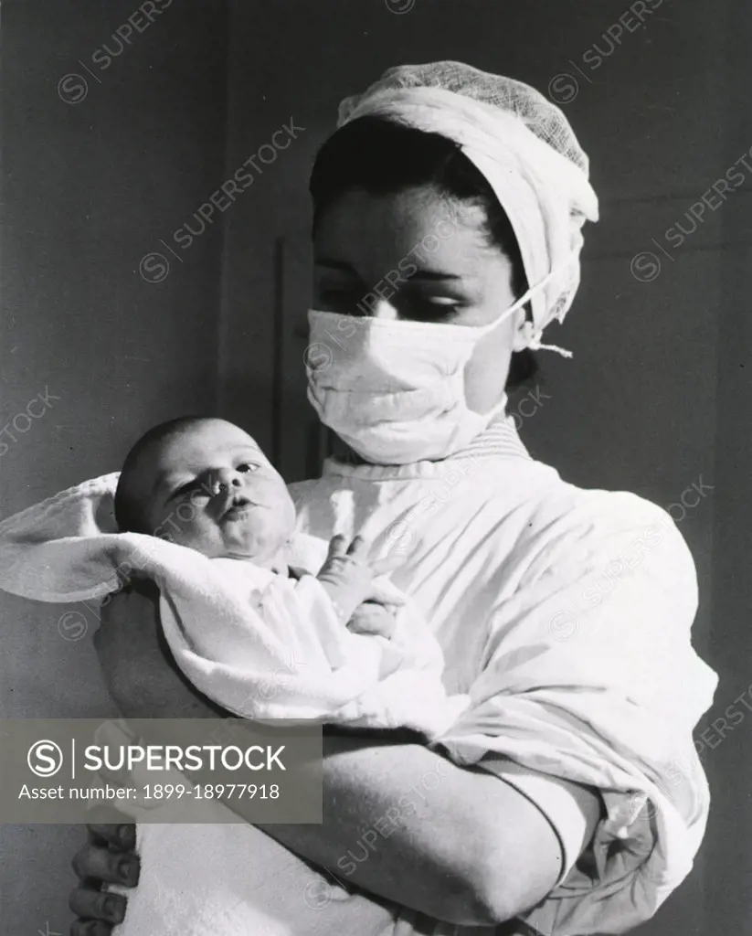 Nurse with baby, Frankfurt, Germany ca. 1940s. 
