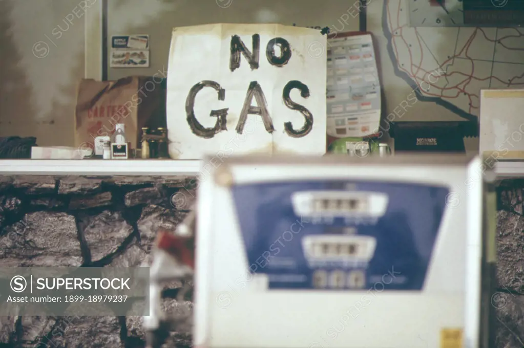 No gas sign on window of gas station and empty gas pump in Portland, Oregon in early 1970s. 