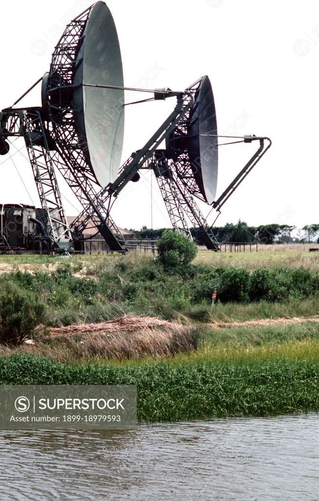 1977 - Two large dish-shaped radar antennas in use during joint readiness training exercise SOLID SHIELD '77. 
