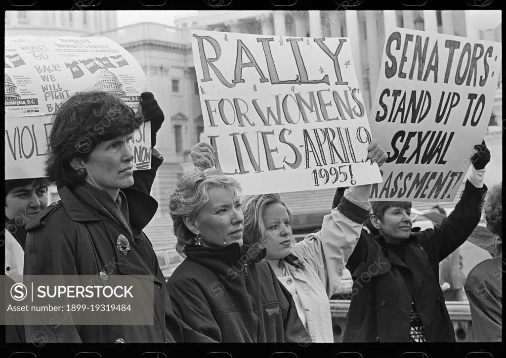 Women outside the U.S. Capitol holding signs supporting the National Organization for Women's 'Rally for Women's Lives' and against sexual harassment, probably in reference to the accusations against Senator Bob Packwood Contributor Names  Keating, Maureen, photographer  Created / Published  1 April 1995