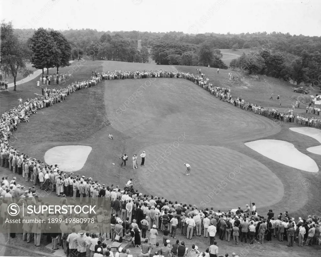 Crowd gathered around the 18th green at the Wykagyl Country Club to watch Bobby Locke of South Africa at the Palm Beach round-robin tournament. New Rochelle, NY, 6/8/51.