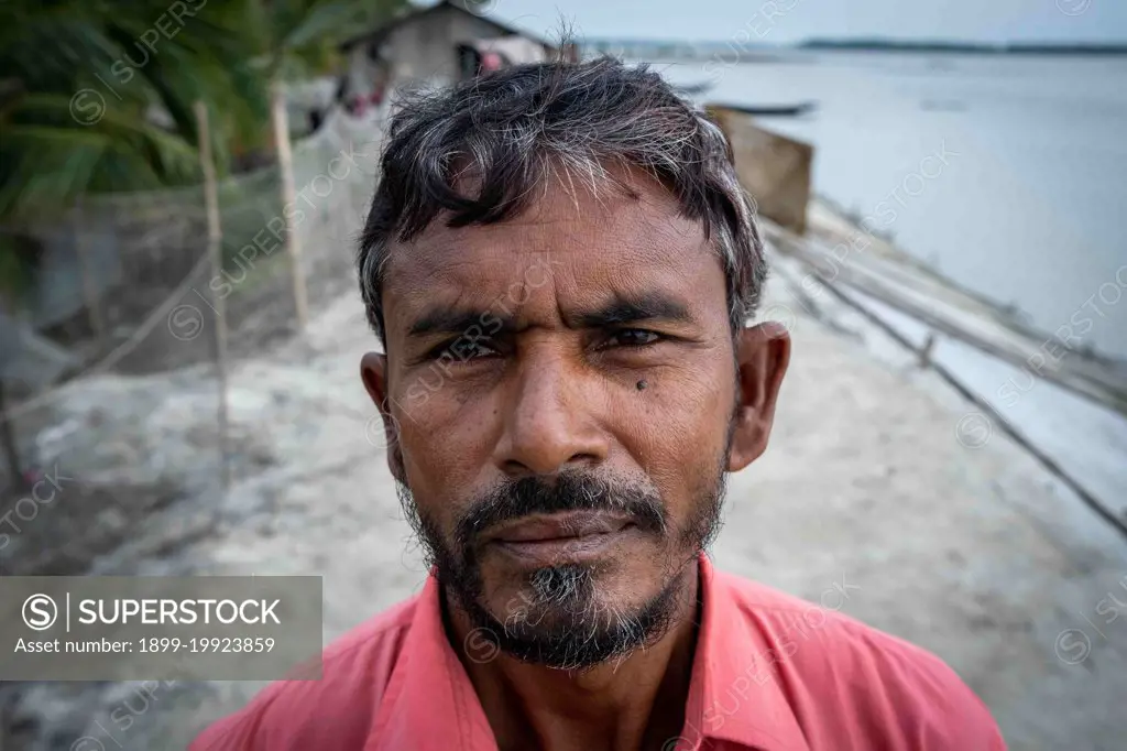 The Pratab Nagar village is severely affected by climate change, including rising water levels, erosion and salinisation. Satkhira Province, Bangladesh. (Photo by: Martin Bertrand/Majority World/UIG)