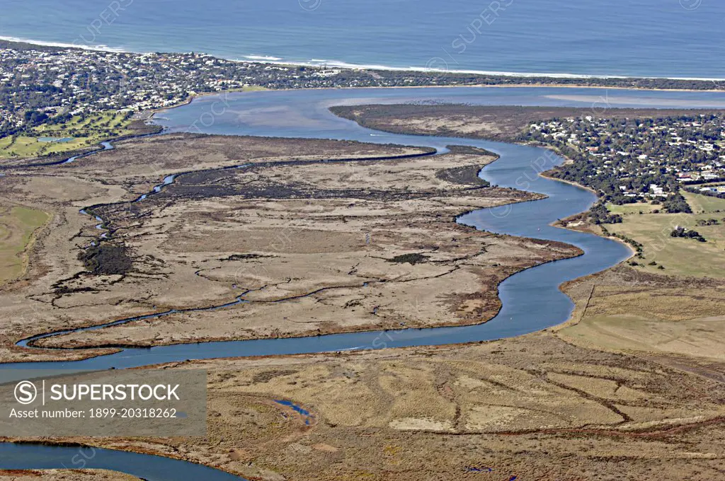 Barwon River aerial image. The mouth of the river is at Barwon Heads and situated south of Geelong on the edge of Bass Strait, Barwon Heads, Victoria, Australia