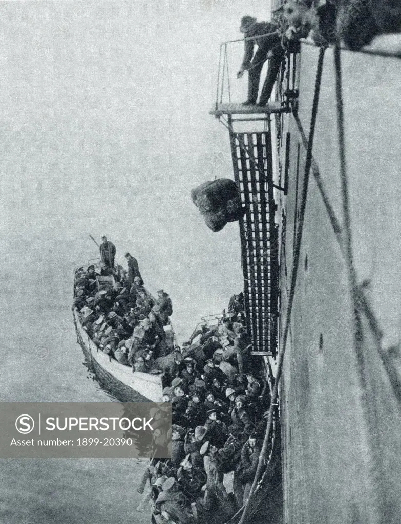 Troops and stores being landed in Gallipoli from a British ship during World War I. From The Illustrated War News 1915.