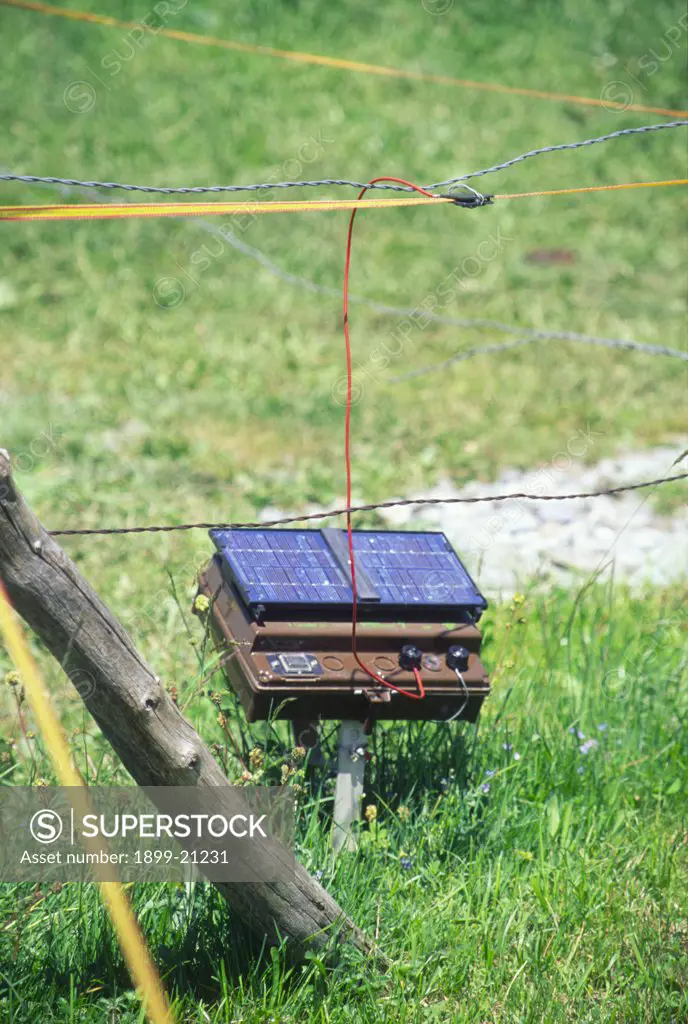 Electrified cattle fence solar powered, Switzerland. Electrified cattle fence, solar powered. Convenient energy source for remote farm location - renwable ,sustainable, minimal running costs.