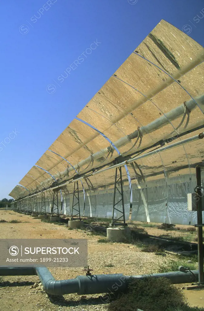 Ben-Gurion National Solar Energy Centre, Israel. LS-2 parabolic trough system. Ben-Gurion National Solar Energy Centre solar power plant in the desert. This experimental trough system generates approximately 1000 kW of thermal power using horizontal-axis parabolic trough collectors.