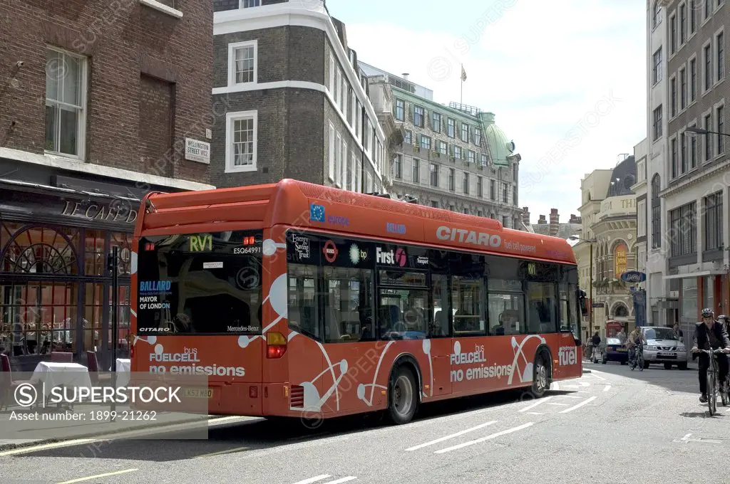 Fuel cell bus in London, United Kingdom. Fuel cell bus in London, a project to reduce air pollution and noise and produce zero emission. Hydrogen is stored in cylinders on top of the bus beside the fuel cell stakes and the cooling units. Hydrogen reacts with oxygen to produce water and energy - the only emission is water vapour.