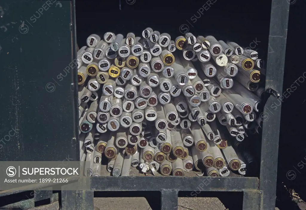 Florescent tubes being stored at the local council tip before being transported for recycling - Isle of Angelesey, North Wales, United Kingdom. 