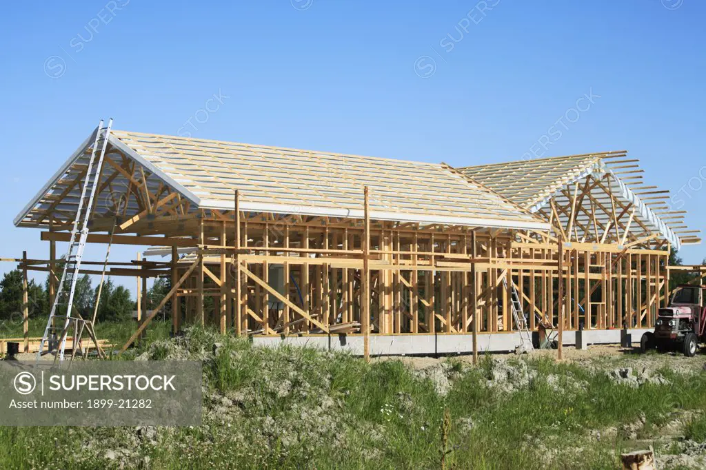 Constructing a wooden house. 