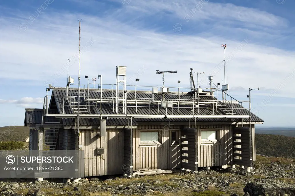 Sammaltunturi research station, Finland. Sammaltunturi research station (67í58'N, 24í07'E), on top of a fjeld (Arctic hill) inside the northern boreal forest zone, 560m above sea level, showing instrument towers and weather sensors. The station is maintained by the Finnish Meteorological Institute (FMI) and the Finnish Forest Research Institute (METLA). 