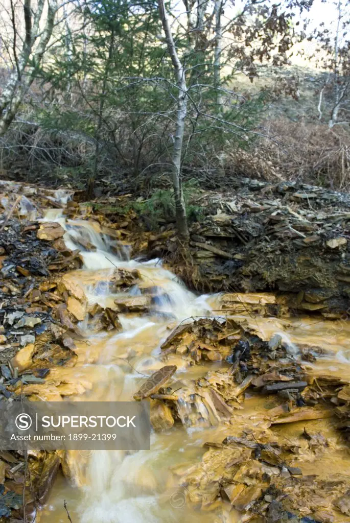 Stream polluted with mine discharge management difficult due to mines being abandoned and flooded. Ownership not established. . 