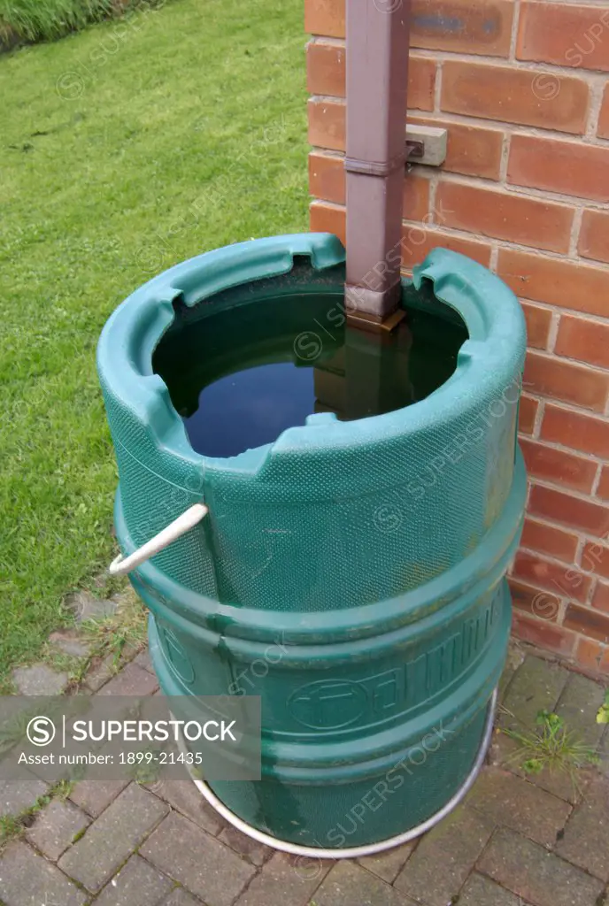 Water butt for collecting rainwater, United Kingdom. 