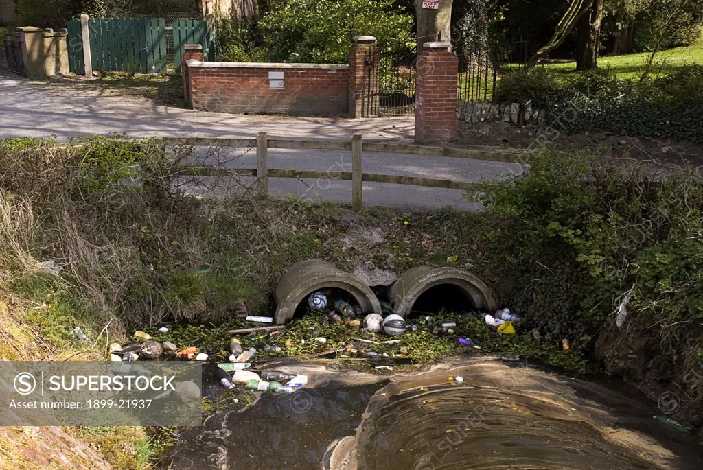 IRELAND, Monaghan Town. Household rubbish dumped in a local stream Ireland Eire. . 