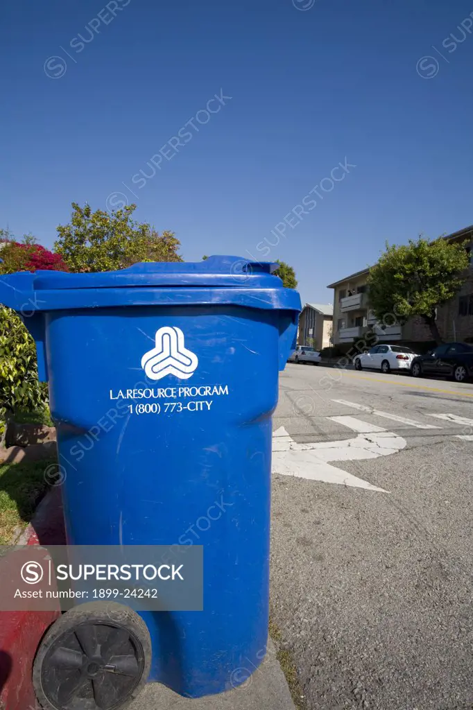 A Blue trash bin for the City of Los Angeles Bureau of Sanitations Solid Resources Citywide Recycling Program. The program collects refuse, from more than 750,000 homes, an average of 6,652 tons per day. . 