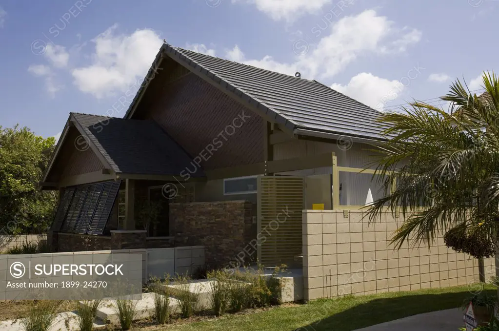 House in Long Beach retrofitted with Building Integrated Photovoltaics (BIPV) Modules, California, USA. 