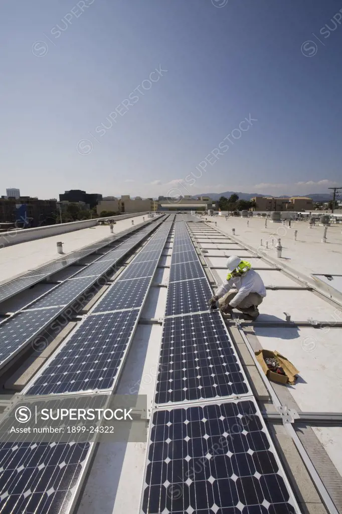 Installaion of Grid-tied solar array on roof of Big Blue Bus facilites, Santa Monica, California, USA. 