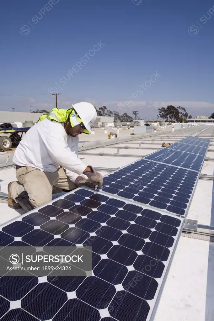 Installaion of Grid-tied solar array on roof of Big Blue Bus facilites, Santa Monica, California, USA. 