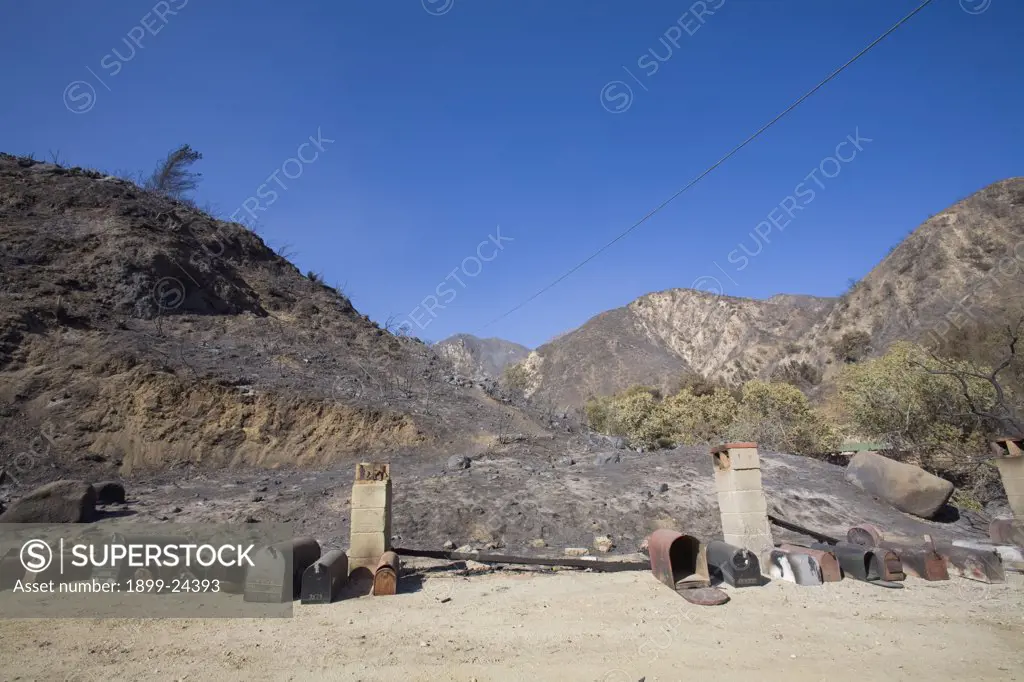Station Fire, Sept 5, 2009. Houses and maiboxes devastated by Station fire, Sept 5 2009. Big Tunjunga Canyon Road, San Gabriel Mountains, Angeles National Forest, Los Angeles, California ,USA