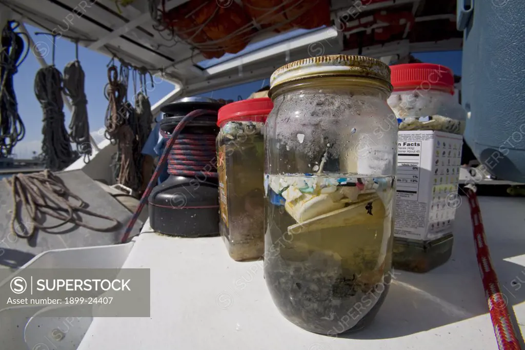 2009 Pacific Exploration of the ORV Alguita. Plastic sample jars. The ORV Alguita returns to Long beach after four months at sea sampling the waters of the great Pacific garbage patch' in the North Pacific Subtropical Gyre (NPSG). The Algalita Marine Research Foundation has been studying and educating the public about the effects of oceanic micro-plastic pollution on the ocean's ecosystem and marine life for over ten years. Long Beach, California, USA.