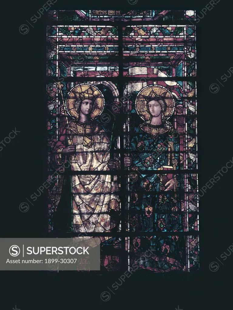 Window with two saints, by Unknown, 15th Century, stained-glass window. Italy, Tuscany, Florence, Santa Maria del Fiore Basilica, window above side-aisle. Detail. Window ogive arch bottom figures standing in rectangular frame on right young male blond beardless figure in three-quarter profile halo: aureole clipeus holding stick with lilies in right hand on left young fem.
