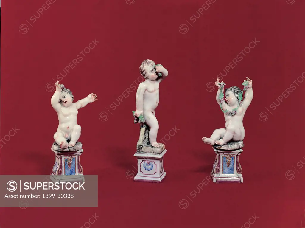 Statuettes of cherubs, Doccia Porcelain Factory, by Unknown, 18th Century, porcelain. Italy, Campania, Naples, Capodimonte National Museum and Galleries. Whole artwork. Colored porcelain statuettes naked putti standing sitting curls ivy.