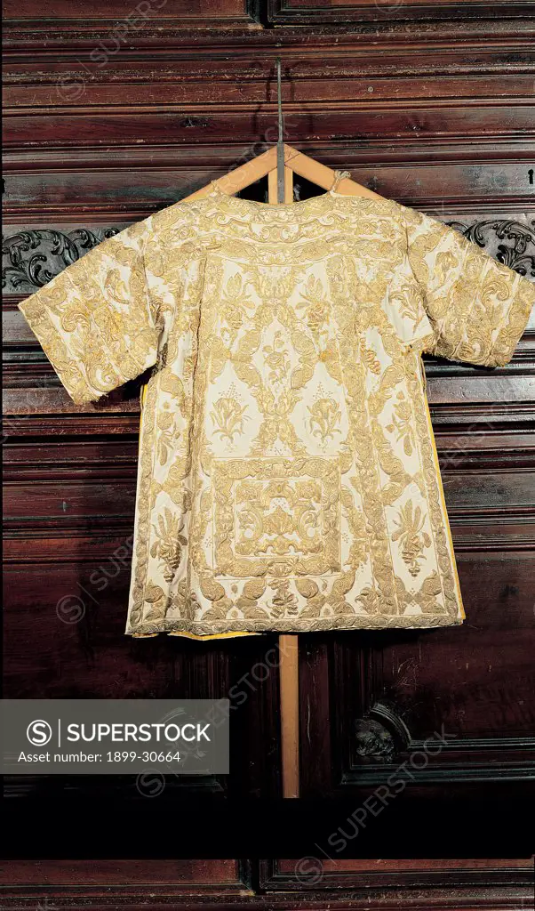 Holy vestment of tunic, by Unknown, 18th Century, silk embroided in gold. Italy, Lombardy, Milan, Santa Maria del Carmine Church. Whole artwork. Vestment holy tunic: habit embroidered fabric.