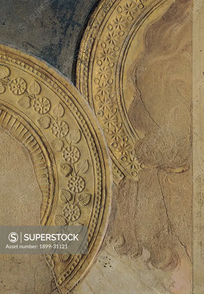The Majesty, by Martini Simone, 1313 - 1315, 14th Century, fresco. Italy, Tuscany, Siena, Palazzo Pubblico, Sala del Mappamondo. Detail. Halos: aureoles turn of St Paul and an angel decoration gold stylized flowers.