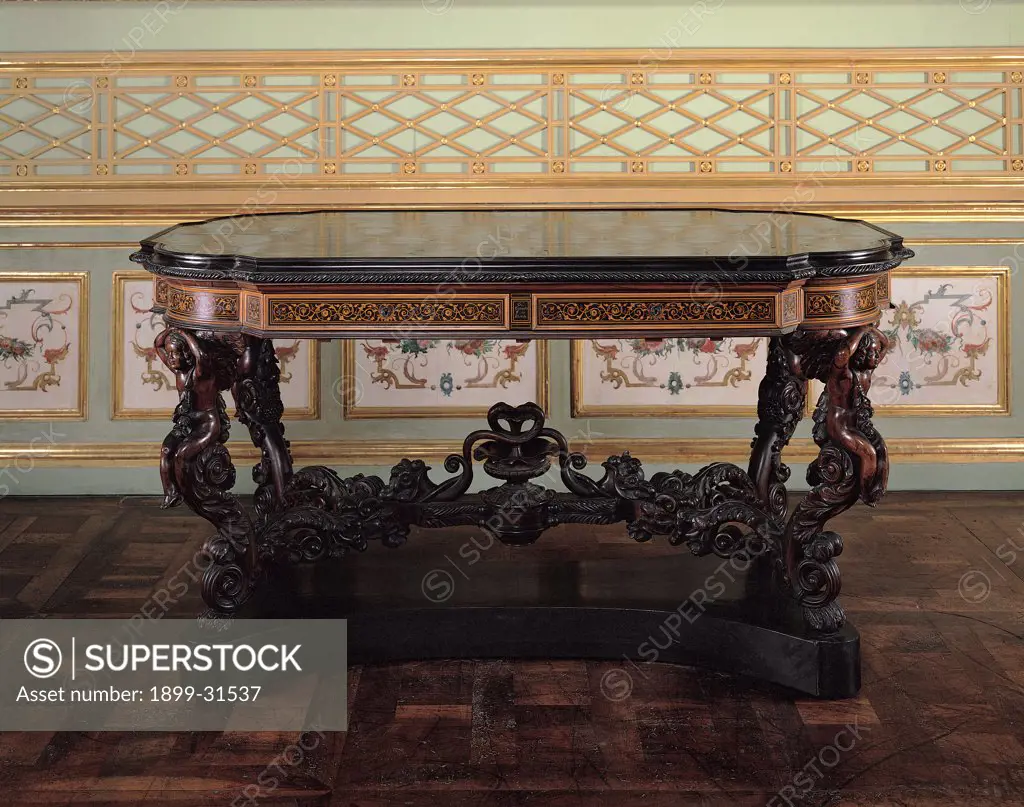 Table, by Ciaudo Giuseppe, 1850, 19th Century, mahogany wood, avory inlaid. Italy, Piemonte, Turin, Royal Palace. View. Table rinceaux volutes top decoration putti: cherubs phytomorphic motifs.