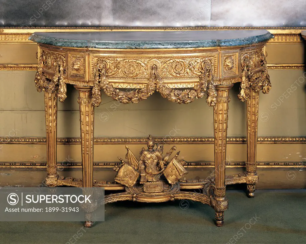 Console table, by Piedmont Work, 1780, 18th Century, wood carved and gilded. Italy, Piemonte, Turin, Royal Palace. Whole artwork. Console table wall table gold oval phytomorphic motifs garlands banners: standards armor.
