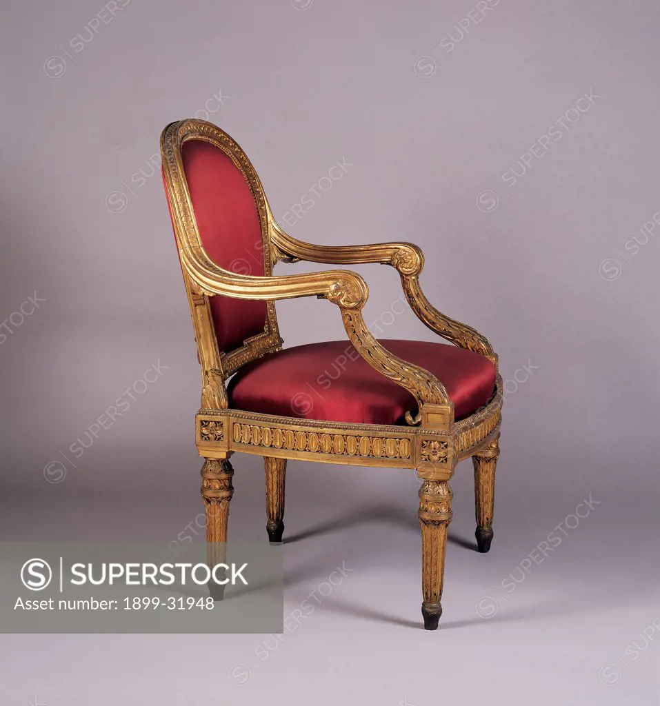 Armchair, by Turin Work, 18th Century, wood carved and gilded, pad and silk. Italy, Piemonte, Turin, Royal Palace. View armchair gold gilt: gilding wood decorated padding: upholstery red silk tissue: fabric.
