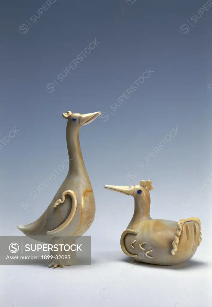 Two ducks, by Buzzi Tommaso, 1933, 20th Century, glass and silver leaf. Italy, Veneto, Venice, private collection. Whole artwork. Geese blown glass white bronze.