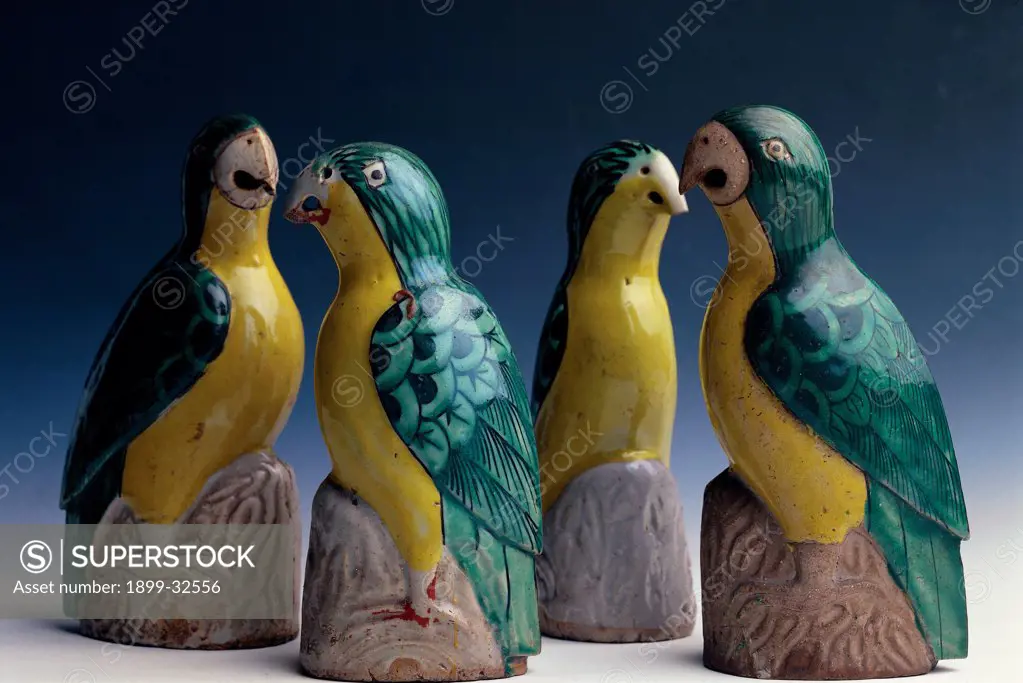 Vittoriale of Parrots, by Unknown, 18th Century, pottery. Italy, Lombardy, Gardone Riviera, Brescia, The Vittoriale. Whole artwork. Knick-knacks winged creatures birds parrots green yellow.