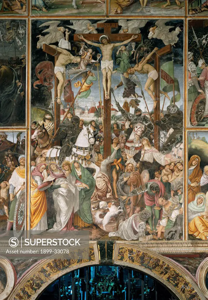 The Crucifixion, by Ferrari Gaudenzio, 1513, 16th Century, fresco. Italy, Piemonte, Varallo Sesia, Vercelli, Santa Maria delle Grazie church, partition wall. Whole artwork. Crucifixion Jesus Christ thieves angels demons guards horses horsemen faint the Pious Women men flags: banners Roman vexilla cross.