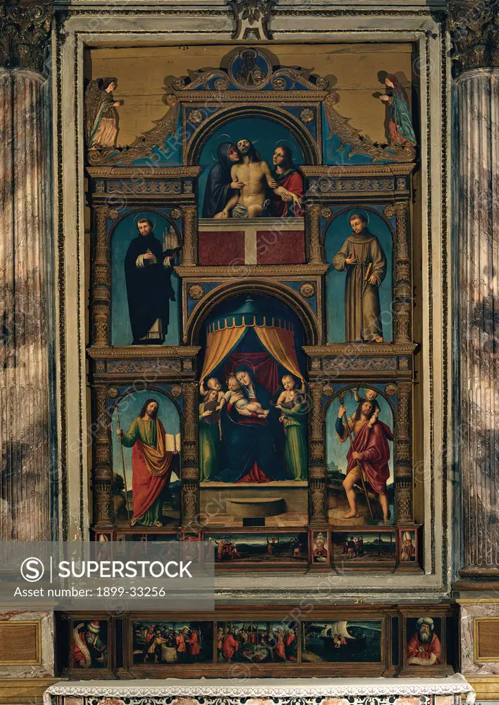 Polyptych with Madonna and Child Enthroned, by attributed De Ferrari Bernardino, 16th Century, panel. Italy, Lombardy, Vigevano, Pavia, Cathedral. Whole artwork. Polyptych altarpiece Madonna Enthroned Virgin Mary canopy: baldachin lamentation dead Christ Madonnas afflicted saints.