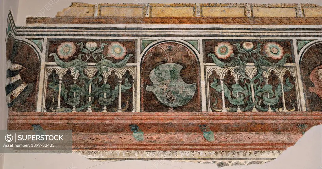 Frieze with fake loggia and Gonzaga devices, by co-worker probably Antonio Pisano detto il Pisanello, 15th Century, fresco. Italy, Lombardy, Mantua, Ducal Palace. Whole artwork. Frieze with fake loggia Gonzaga devices trefoil arches floral ornament phytomorphic decoration flowers leaf emblems: coat of arms white green pink brown tones: hues yellow.