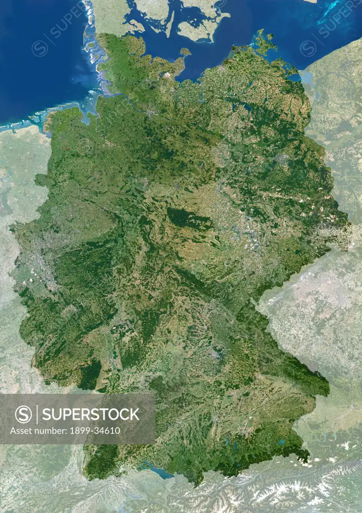 Germany, True Colour Satellite Image With Mask. Germany, true colour satellite image with mask. This is the largest country in Europe in terms of population, at around 82 million (2006). To its north it borders the Jutland peninsula, which is part of Denmark. East of this is the Baltic Sea, west of it the North Sea. At centre left is the Netherlands, and below that Belgium and France. To its east are Poland (centre right) and the Czech Republic (lower right). The snow-capped Alps mountains (acro