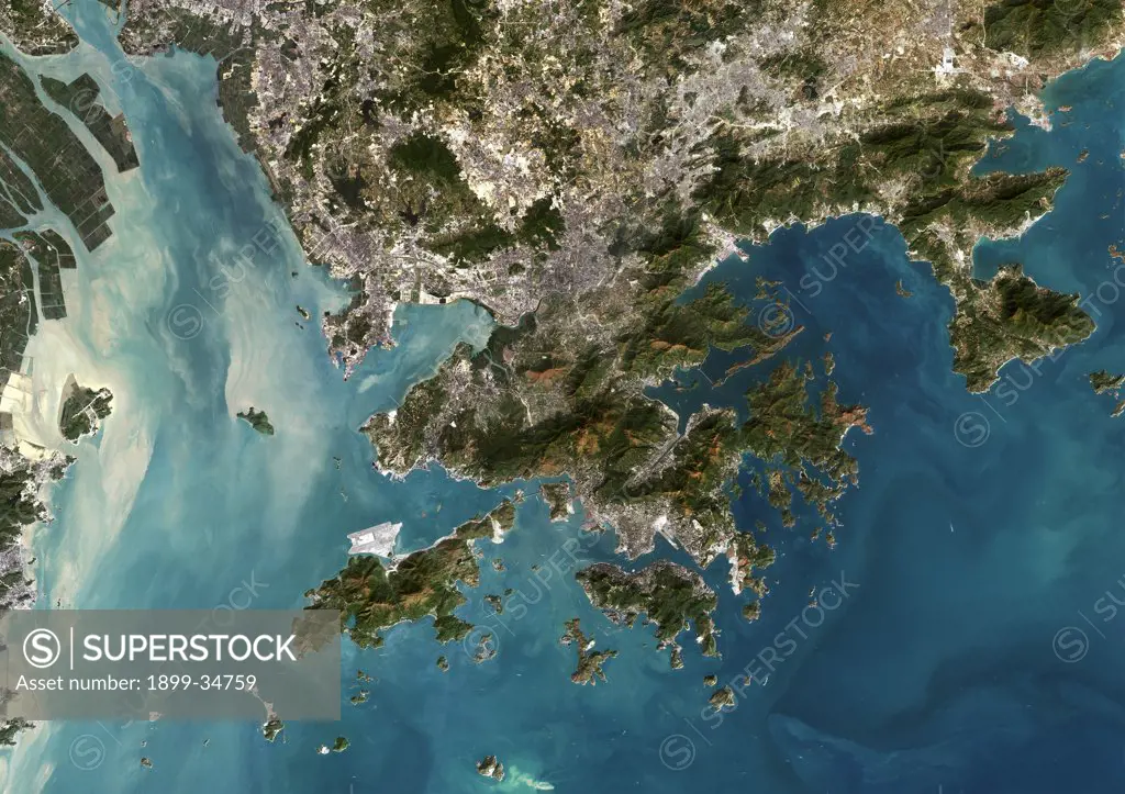 Hong Kong, China, True Colour Satellite Image. Hong Kong, People's Republic of China. True colour satellite image of the city of Hong Kong. Composite of 3 images taken on 31 December 2001, 14 September 2000 & 15 November 1999, using LANDSAT 7 data.