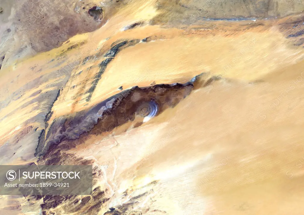 Richat Structure, Mauritania, True Colour Satellite Image. Richat Structure, Mauritania, true colour satellite image. The Richat structure is a geological formation in the Maur Adrar Desert in the African country of Mauritania. Although it resembles an impact crater, the Richat Structure formed when a volcanic dome hardened and gradually eroded, exposing the onion-like layers of rock. Image taken on 13 January 2003 using LANDSAT data.