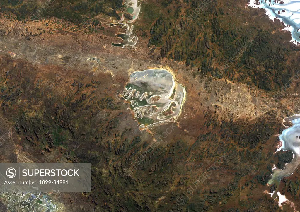 Acraman Meteor Impact Crater, Australia, True Colour Satellite Image. True colour satellite image of Acraman impact structure, Australia (age : 570 million years ; diameter : 160 km ). Image taken on 13 August 1989 using LANDSAT data.