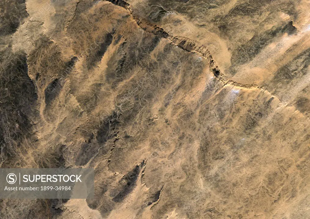 Aouelloul Meteor Impact Crater, Mauritania, True Colour Satellite Image. True colour satellite image of Aouelloul impact structure, Mauritania (diameter : 390 m). Image taken on 13 January 1987 using LANDSAT data.