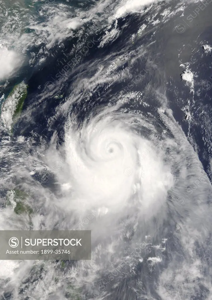 Typhoon Ewiniar, Pacific Ocean, In 2006, True Colour Satellite Image. Typhoon Ewiniar on 7 July 2006 over the Pacific ocean. True-colour satellite image using MODIS data.