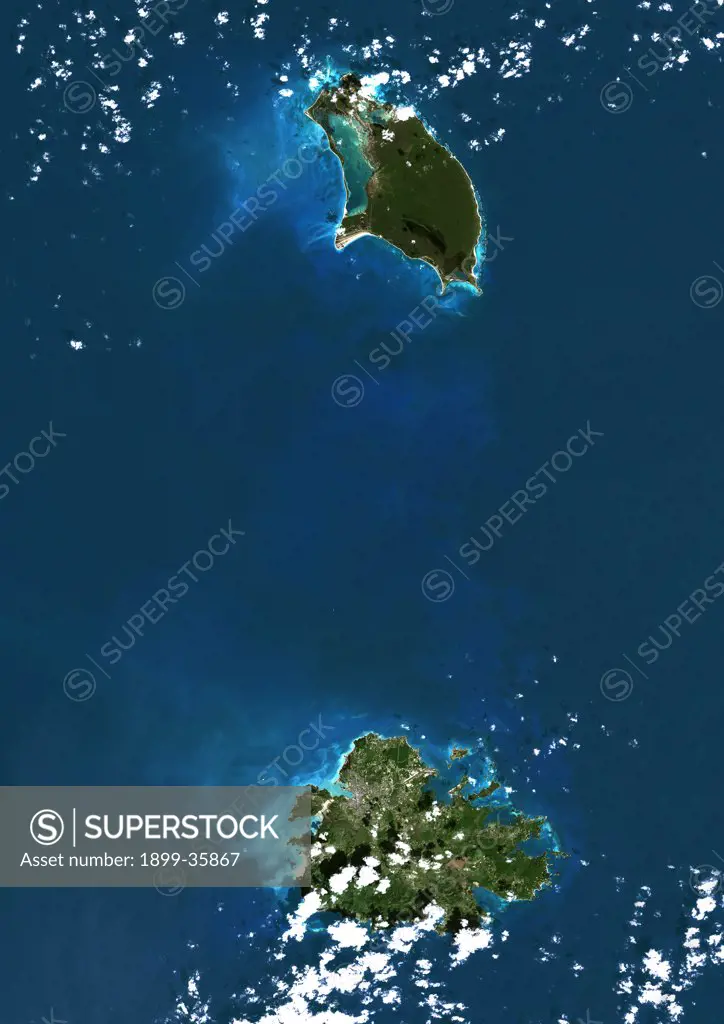 Antigua And Barbuda, True Colour Satellite Image. Antigua and Barbuda, true colour satellite image. Barbuda is at top. Antigua is at bottom center. This image was taken on 8 December 1999, by the LANDSAT 7 satellite.