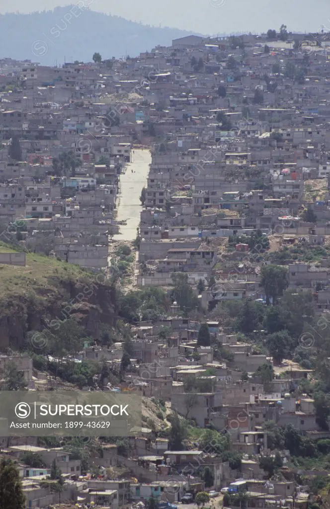 URBAN SPRAWL, MEXICO CITY, Chalco District. . These houses on the outskirts of the city have been built within a year. The people who live there are mostly migrants to the city, forced off there land which eroded away. 