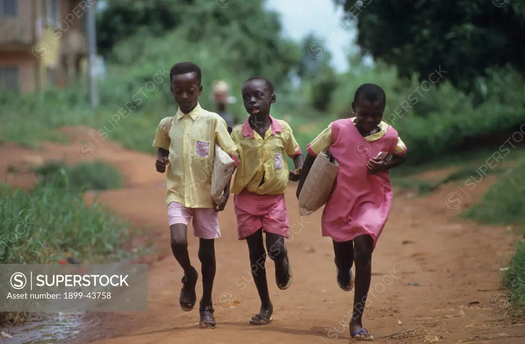 CHILDREN GOING TO SCHOOL, NIGERIA. Primary school in Benin city. . 