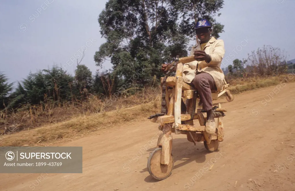 KIDS ON WOODEN BIKES, CAMEROON. Mount Oku, Bamenda Highlands. Wooden bicycle - strange but true. . 