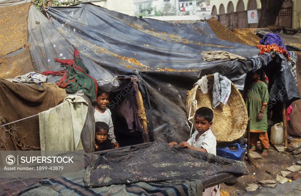 STREET DWELLERS - BOMBAY, INDIA. Environmental refugees from Rajasthan living on the streets of Bombay. . 