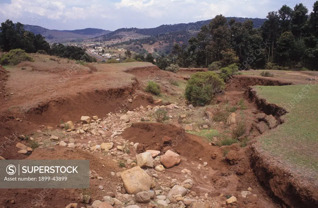 SOIL EROSION, MEXICO. El Jasmin - 100km from Meico City. . Trees are cut down to enlarge farms and the land erodes. Peasants are forced off the land and migrate to nearby cities. 