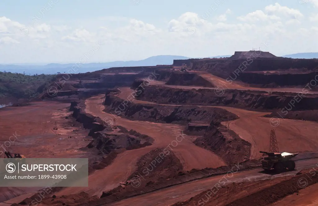 CARAJAS IRON ORE MINE, BRAZIL. Amazon, Carajas. The Carajas mountains contain the largest iron ore deposit in the World and the purest - 66% iron. . The mine is financed by international development banks and multinationals and may earn 10 billion dollars a year. 